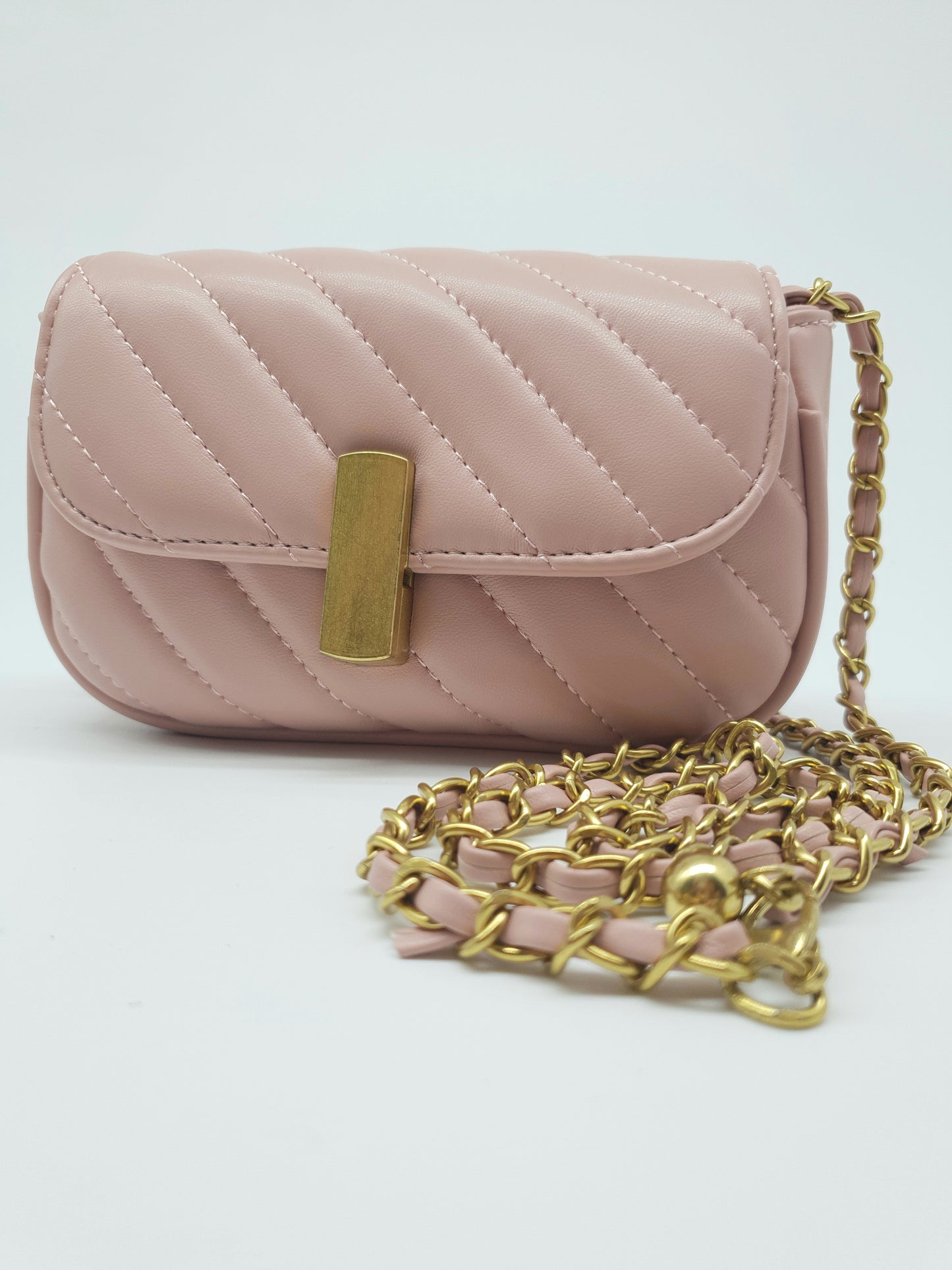 larger pink bag , gold buckle and shoulder straps. Mother Daughter bag