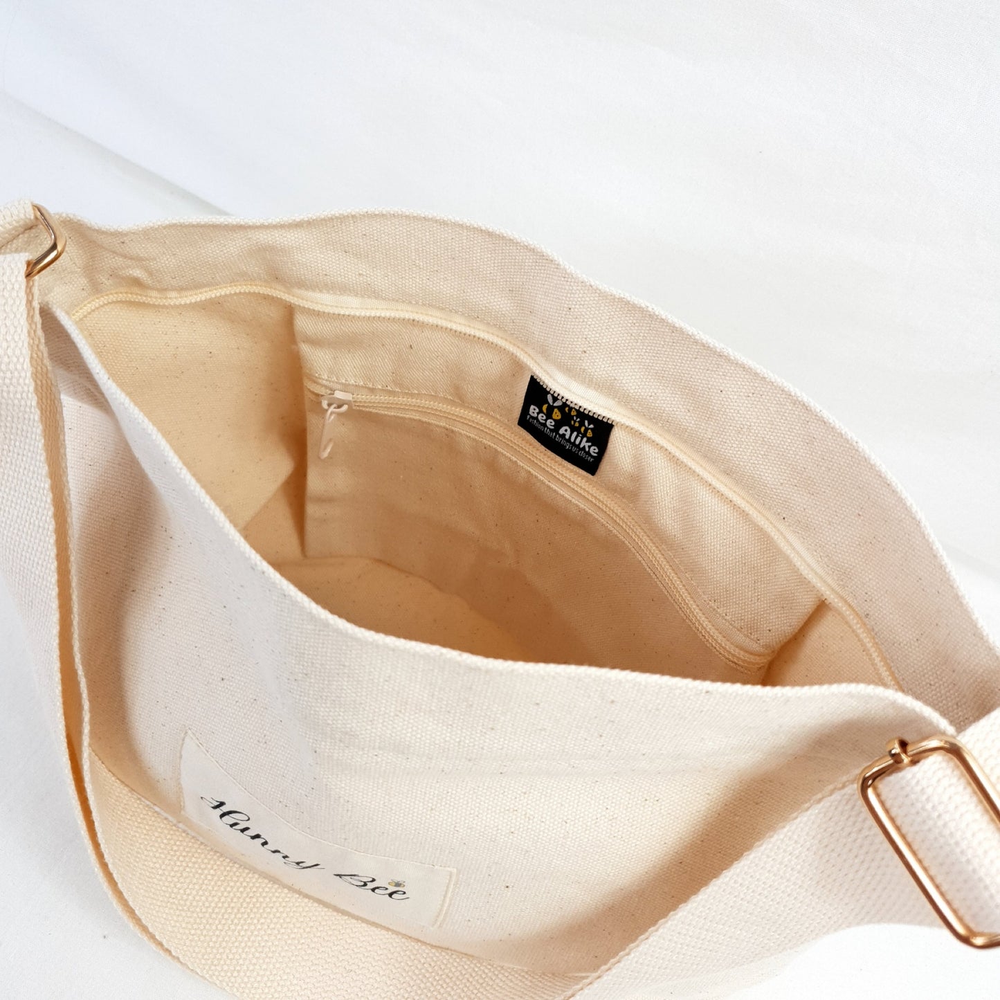 inside picture of child's bag, has internal pocket with zipper. Mummy and Me crossbody bags