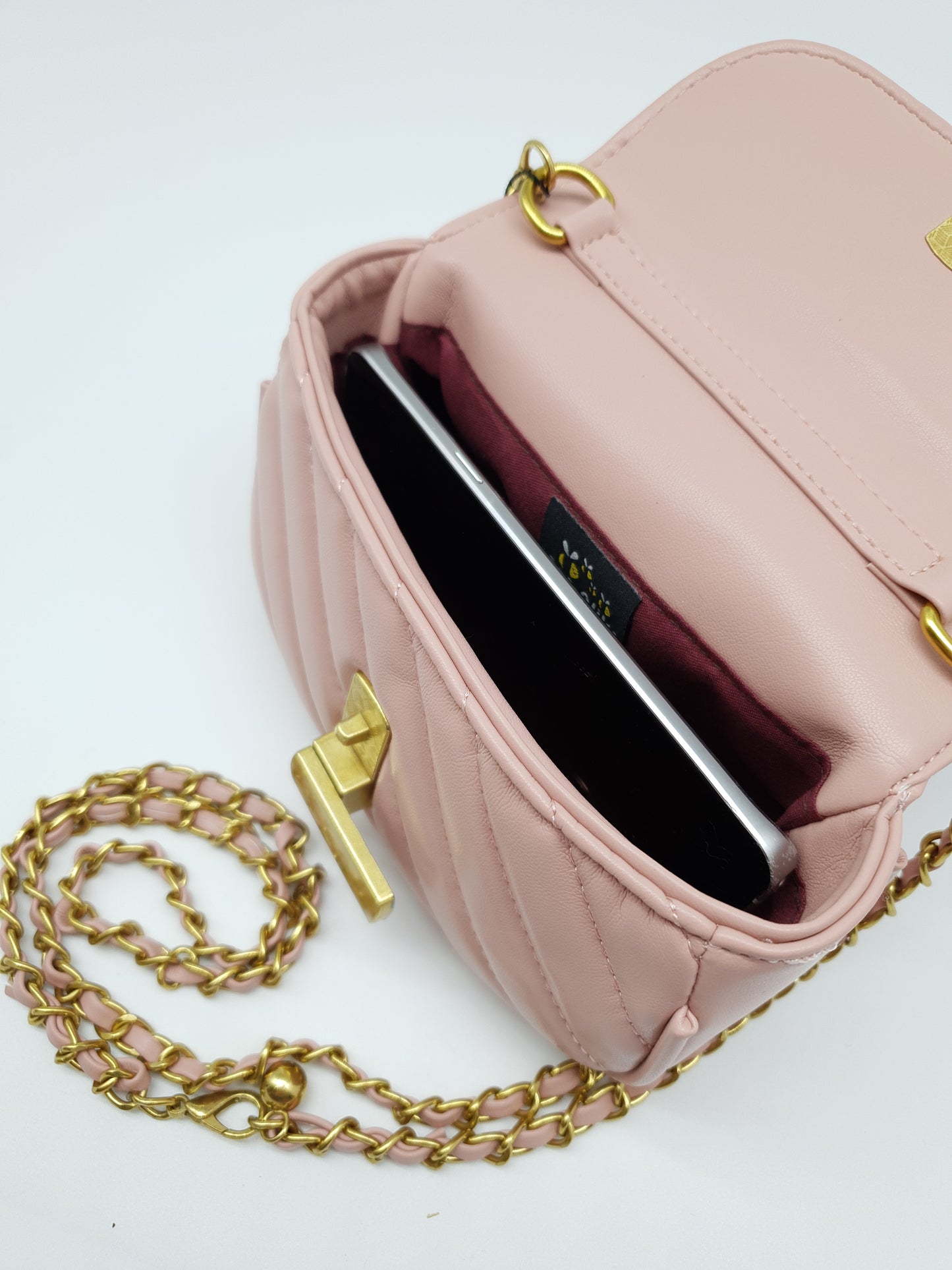 Inside of the bag , gold buckle with gold shoulder straps. Mother Daughter bag 