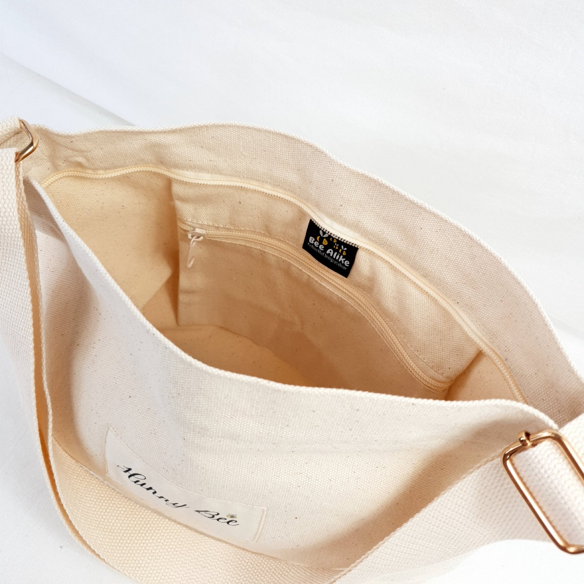 inside picture of child's bag, has internal pocket with zipper. Mummy and Me crossbody bags