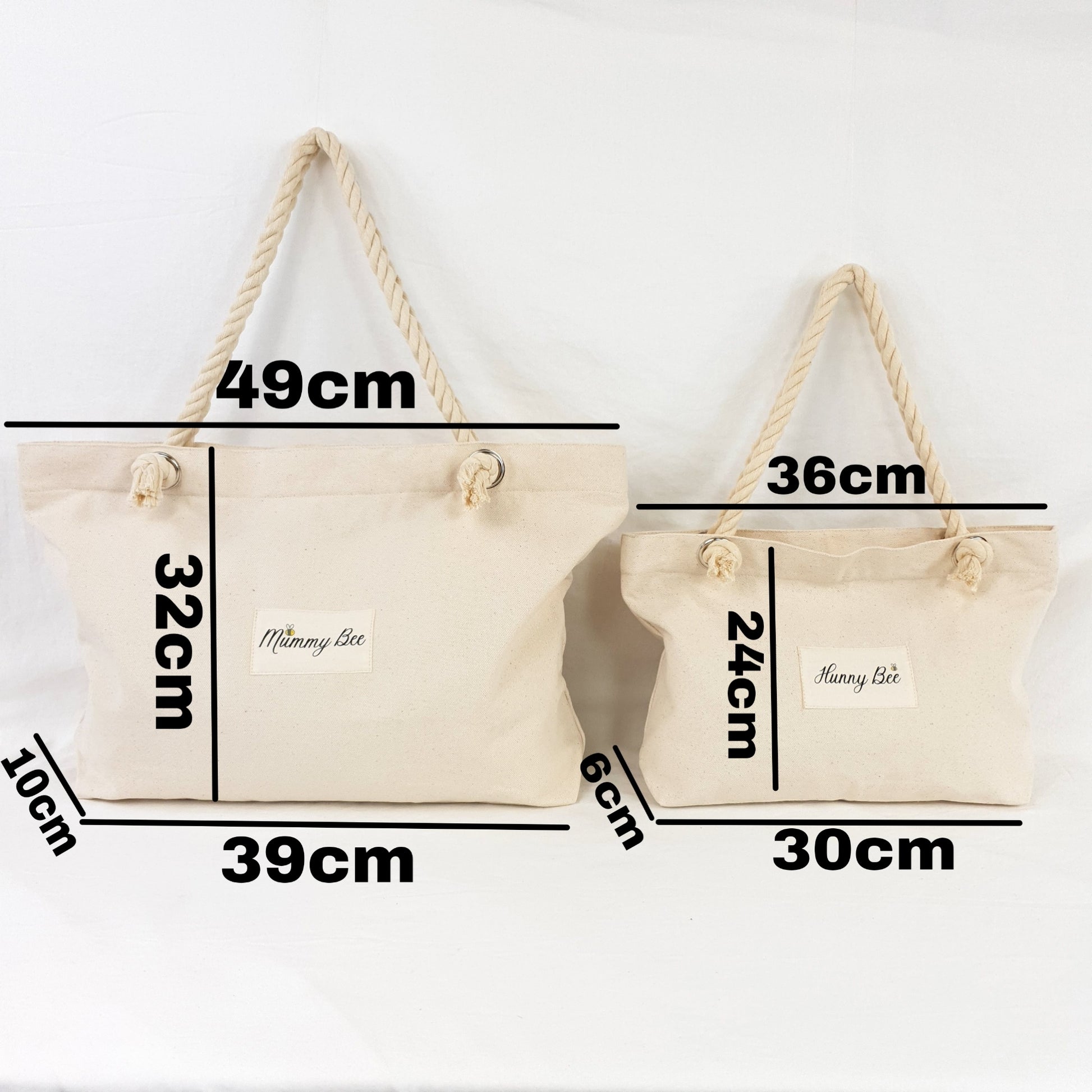 Measurements of mummy and me bags, adult bag is 49x32x10xcm and child tote bag is 36x24x6cm